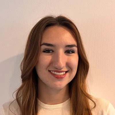 Chiropractic London ON Shelby Chiropractic Assistant Shelby Smiling In Sweater